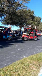 No, this is NOT the result of too many trips to the Tiki Bar at the Spanish Springs town square in The Villages. It's actually a precision golf cart driving team showing how they can handle their carts with style. | Jim Knight