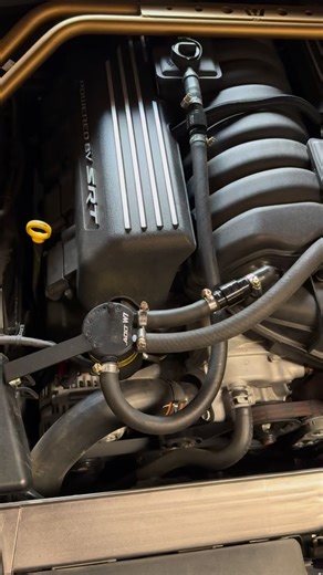 Their catch can vs our catch can. This customer came in complaining about a check engine light he had on his car after the dealership installed this catch can on his car. We decided to take that mess off and install our own catch can. How’s it look now? 🔍 Currently we are sold out but we will have a restock soon with our new updated SRT Autoworks logo. | SRT Autoworks