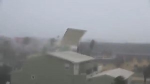 Hurricane wind tears roof off home
