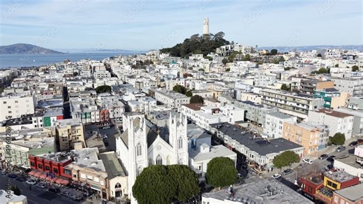 Aerial view of San Francisco with Washington Square Park, Saints Peter and Paul Church and bay skyline. g.
