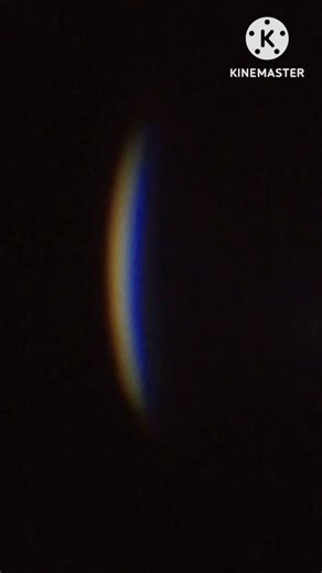 Trying to create a rainbow with flashlight and a magnifying glass