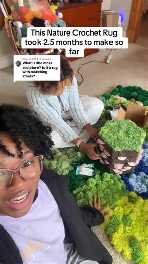 Ayana Williams on Instagram: "Hi, my name is Ayana Williams (The one in the robe 😅) & I’m bringing my latest fiber art piece that has brought so much light to others on TikTok to Insta ☺️👋🏾 Shout out to my sister who is talking for capturing these moments for me to post for yall ☺️ #fiberarts #pompomrug #DIY #Coffeetable #naturevibe"
