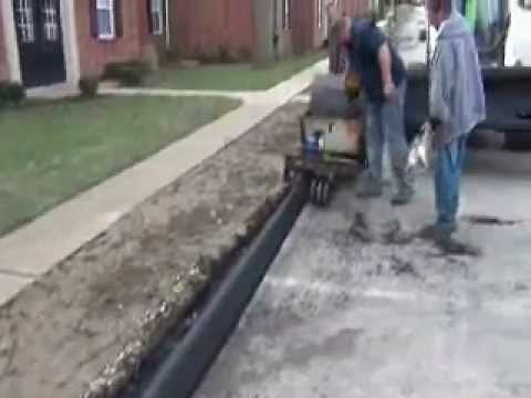 Asphalt Curb - St Louis Paving Inc