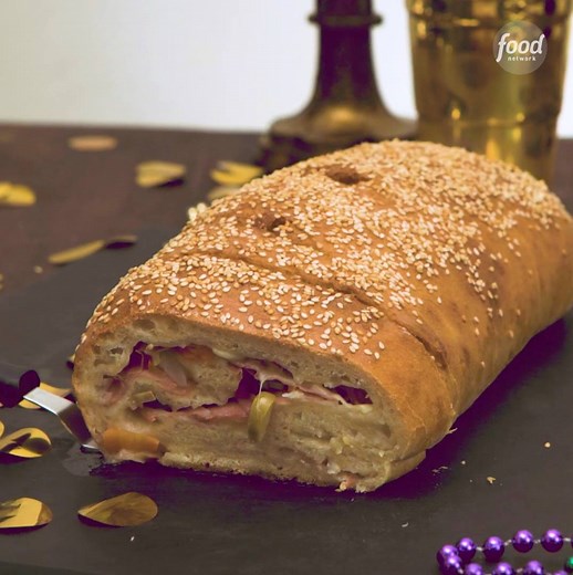 It ain't traditional, but we are still mesmerized by the LAYERS in this Muffuletta Garbage Bread! 🙃 🙃 🙃 Only one week until Mardi Gras: https://foodtv.com/2SQnNa0. | Food Network