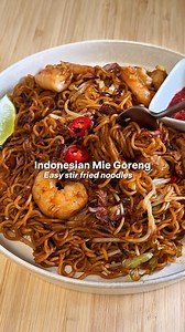 Mie Goreng is Indonesia’s famous stir-fried noodle dish! With springy noodles, crunchy veggies, juicy prawns, and the perfect balance of soy, garlic, and chilli, it’s a one-pan wonder you’ll crave again and again. Get the full recipe HERE: https://bit.ly/4lPivUN #asianinspirations #miegoreng #indonesianrecipe | Asian Inspirations