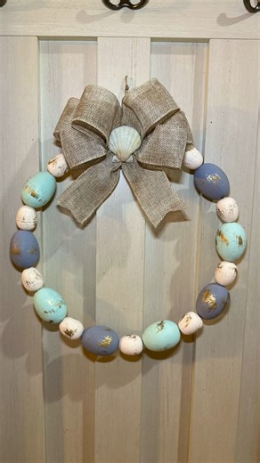9.9K views · 50 reactions | Easy Coastal Easter Egg Wreath Dollar Tree DIY #dollartree #dollartreediy #crafting #craftybeach #easterdiy | Crafty Beach | Facebook