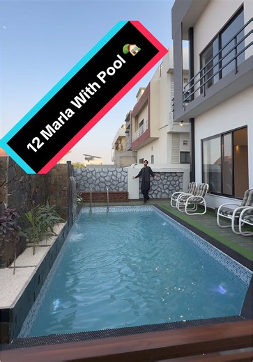 12 Marla Designer House With Pool📞 0302-3305996 / 0337-7098987 / 0345-7219228 - *4,400* square feet *covered Area* - *⁠A High End* Design & Construction - Top Height Location near *Park*, *Masjid* & *Commercial* in Well *Populated* area - ⁠Full size *Swimming Pool* & 2 Additional *Mezzanine Lounges* - *PORTA* Concealed Sanitary - ⁠Imported *Concealed* & Faisal CP fittings - *Dishwasher, Ftont Load Washing Machine, 2 Convection ovens & 2 Microwave ovens* included - *Double unit* with *4 TV Loung