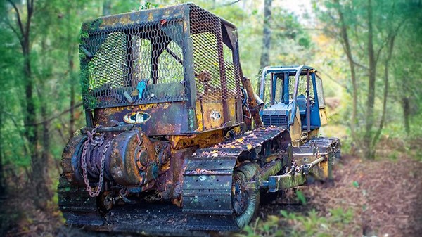 Recovering a farm tractor lost in the woods