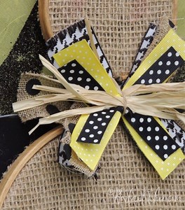 Join me as we get crafty and make this adorable Bumble Bee. I used a few embroidery hoops and a set of wings from the Dollar Tree. This guy will look perfect on my front porch this summer-2020! #frontporchdecor #embroideryhoops #bumblebee #summer2020 | Burlap Kitchen