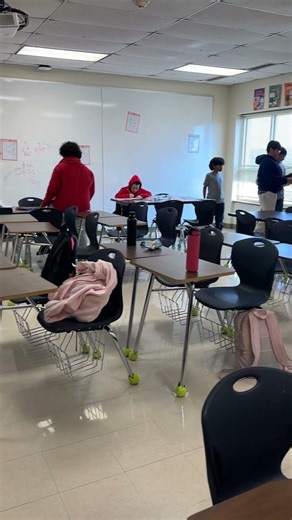 Math classroom: students collaborating, risk-taking, & visible problem-solving.