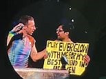 Moving moment Chris Martin pulls fan on stage to sing tribute to late friend