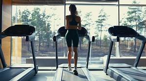 clip-1092648269-get-faster-rear-view-young-cheerful-woman