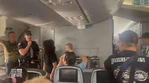 More than a hundred furious Jetstar passengers have been stuck on an aircraft for more than 14 hours. Their flight to Melbourne from Bangkok, struck trouble after it had to divert to Alice Springs. #9News | WATCH LIVE 6pm | 9 News
