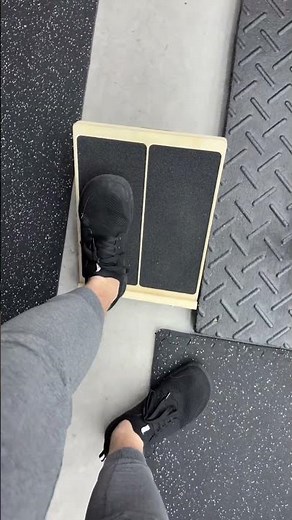 Wooden slant board for calf stretches, tib raises, and ankle mobility — perfect for relieving shin