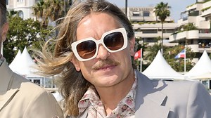 Take That's Mark Owen looks unrecognisable as the band join Tom Cruise