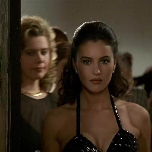 In La Riffa (1991), the plot centers on a raffle where twenty men pay 100 million lire for the right to live with Francesca for 4 years. Monica Bellucci called her look as “evil beauty,” a French term for beauty you are born with rather than beauty you have earned through work.