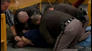 WARNING: GRAPHIC LANGUAGE. The father of three victims to attack disgraced ex-sports doctor Larry Nassar in a Michigan courtroom and was tackled by bailiffs. http://www.fox5ny.com/news/father-of-victim-tries-to-attack-disgraced-doctor-in-court | FOX 5 NY