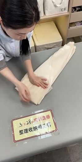 Master the Art of Folding a Dress Like a Pro - No Wrinkles, No Clutter