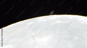 An amazing astronomy event, Saturn covered by the Moon surface awe night sky view from Santiago, Chile, polluted skies with an advanced amateur telescope. Saturn and its rings eclipse by the Moon