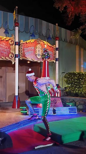 28 reactions | The playful acrobatic elves perform this year in front of Big Top Souvenirs in Magic Kingdom during Mickey’s Very Merry Christmas Party. #wdw #disneyparks #disneyworld #disneychristmas | Disney Diary | Facebook