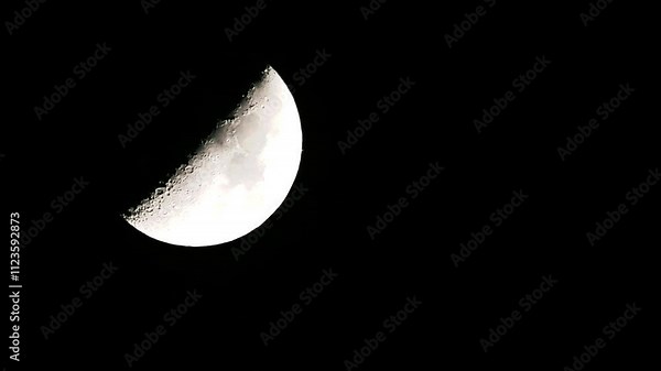 Tokyo,Japan - December 8, 2024: Saturn emerging from the Moon in lunar occultation observed in Tokyo at 19:00 on December 8, 2024.