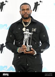 Director Benny Boom poses in the press room with the award for best hip-hop for "Do We Have A Problem?" by Nicki Minaj at the MTV Video Music Awards at the Prudential Center on Sunday, Aug. 28, 2022, in Newark, N.J. (Photo by Evan Agostini/Invision/AP Stock Photo - Alamy