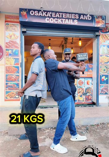 21 kg Wilad Hammer Hold Challenge in Osaka Eateries