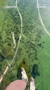 77K views · 1.7K reactions | An ice rescue instructor got the rare opportunity to ice skate over a crystal clear frozen lake, known as an "ice window," in Alaska. | NBC News | Facebook