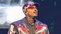 Chris Brown has been arrested in Manchester, U.K., over an alleged incident in 2023 in which producer Abe Diaw accuses Brown of attacking him with a bottle in a nightclub. https://eonline.us/4mxlHWO | E! News