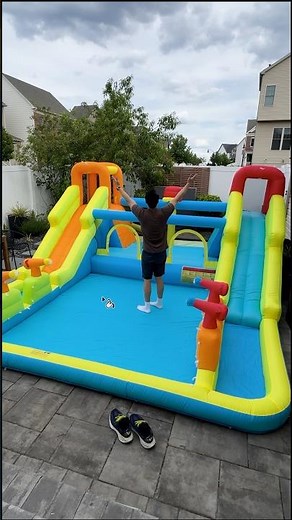 Backyard waterpark with giant tipping bucket. What should the theme be?