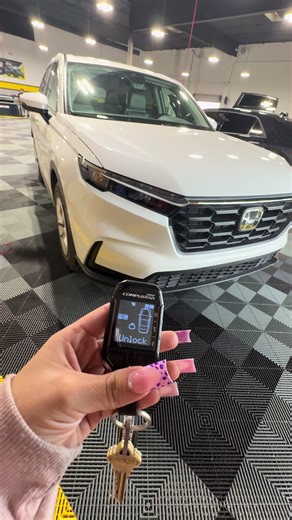 Tint world just installed this beautiful powerful remote start to this Honda ! This compustar is a 2-way powerful car security and remote start system featuring a heads up display fob, that offers the following key features: 24/7 Vehicle Security Monitoring: Monitors for impact, towing, hit-and-runs, and glass breakage. Two-Way Remote Start: Provides a maximum range of 3 miles for remote start and alarm functions. Smartphone Control: Includes an LTE module for smartphone control via the DroneMob