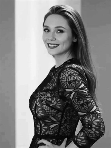 In 1989, in Sherman Oaks, California, Elizabeth Olsen was born into a family already familiar with bright lights and studio cameras. Yet her path was quietly different. As a child in the 1990s, she studied ballet and singing, appearing in small productions while carefully observing the industry from behind the scenes. #actress #elizabetholsen #famous | Scrolls of the Ages