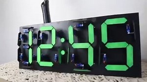 Check out this mechanical 7 segment display clock by Michael...