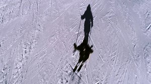 It's been 50 years since the Milk Tray Man first made his television debut, undertaking daring James Bond-style escapades to deliver Cadbury chocolate to a lady with a sweet tooth. Here, we bring you our version inspired by the original, 'And all because the lady loves Tatler', shot on location in the Alps for our 'Powder Dressing' story in the February issue. | Tatler