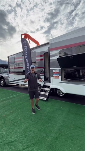 I did NOT expect this to pull me in the way it did. We’re at the Florida RV Super Show, and the RiverStone RV 425FO absolutely stopped us in our tracks. This is a front living floorplan with a front office, and the execution is next level. What makes this one stand out 👇 • True front living room that feels residential • Dedicated front office (huge for remote work) • Premium finishes everywhere you look • High-end furniture and fittings • Hardwood countertops • A layout that actually feels like