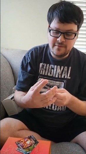 What is included in the Pokemon UPC Charizard box