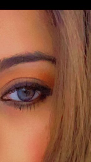 Close-Up Eye and Hand Details in Domestic Setting