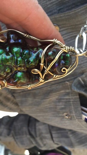 12K views · 376 reactions | David Penny was wearing this beautiful Deer Creek fire agate pendant. I shot this video at the Tucson gem show many years ago :) #differentseasonsjewelry #gemology #gem #artist #geology #crystal #fireagate #Gemstone #tucsongemshow #jewelry | Mark S. Anderson | Facebook