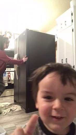 I know some don’t like the black fridge, but can we all agree my toddler is adorable! 🥰 #homereno #budgetrenovations #momcontent #toddler