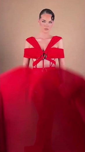 Share with a friend who would own the spotlight in this red corset gown! To order, send us a DM at