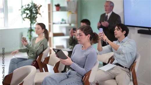 University students scan the qr code during a lecture in front of a qualified teacher. High quality 4k footage