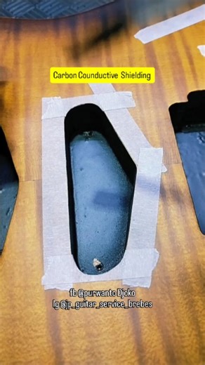 JP guitar Service brebes on Instagram: "Carbon Counductive Shielding [ part 1 ] 🧐 Guitar shielding is the process of coating the electronic cavity of an electric guitar (pickups and cables) with conductive material such as copper/aluminum tape or conductive paint (graphite) to reduce or eliminate unwanted hum and electromagnetic interference (EMI), resulting in a cleaner sound, especially on guitars with single-coil pickups. Follow for more #guitar #guitarist #guitarrepair #shielding #guitarset