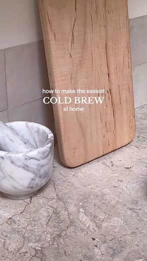 Make Blue Bottle quality cold brew at home with our Hario Cold Brew Bottle. #bluebottlecoffee #coldbrewcoffee #coldbrewrecipe Instructions: 1. Weigh 68 grams of coffee and grind on a coarse setting. 2. Twist to open the filter, then add in the coffee. Close the filter and twist back into the bottle top. 3. Fill the bottle to the top square mark with cold water. Slowly lower the filter into the water and attach to the bottle. Shake gently. 4. Let it brew for 8-12 hours. After 8-12 hours, gently s