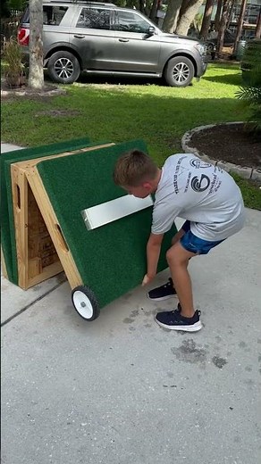 This portable pitcher’s mound is so easy to move!