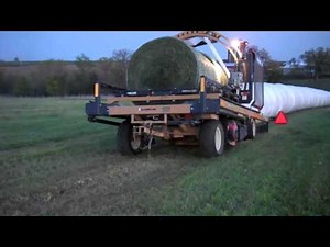 wrapping silage bales.tubeline wrapper