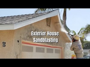 Home remodeler shows how to sandblast the exterior of a house