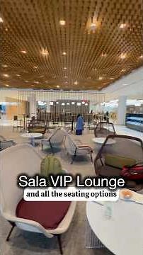 LOTS OF FOOD AND SEATING AT PRIORITY PASS SALA VIP LOUNGE - BARCELONA-EL PRAT INTERNATIONAL AIRPORT