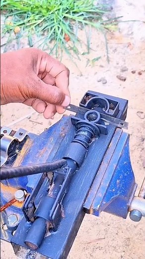 Manufacturing or assembling spring components on metal mounts using a vise #shorts