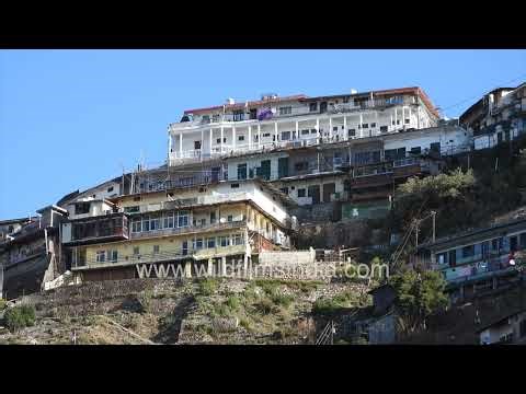 Panoramic shots highlighting how construction dominates Mussoorie hilltops