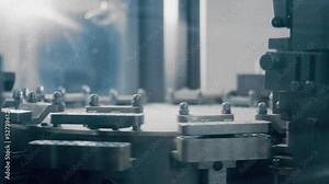 Automatic capsule filling machine, capsule filling device. Production line at a pharmaceutical company. The machine fills the capsule with contents. Production of drugs in tablets. Close up, DOF, 4K